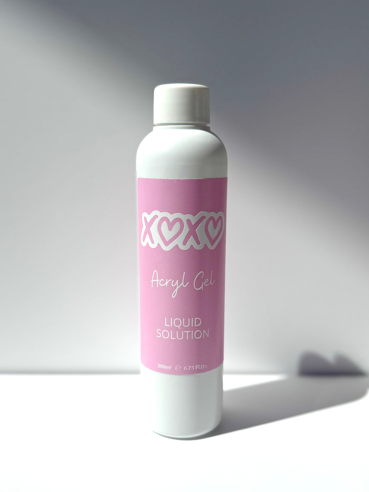 Solución líquida para acrylgel XOXO. Compatible con uñas acrílicas y gel constructor