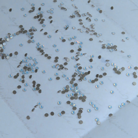 Cristales SWAROVSKI® 2058 redondos - White Opal