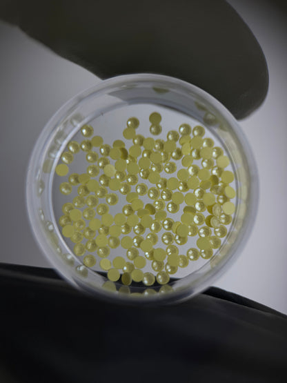 Cristales SWAROVSKI® 2058 redondos - Crystal Yellow Ignite