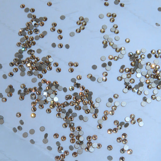 Gemas dentales SWAROVSKI® 2058 redondos - Crystal Golden Shadow