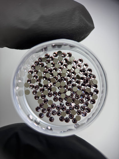 Cristales SWAROVSKI® 2058 redondos - Light Amethyst