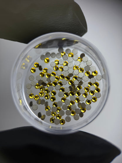 Cristales SWAROVSKI® 2058 redondos - Light Topaz