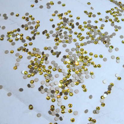 Cristales SWAROVSKI® 2058 redondos - Light Topaz