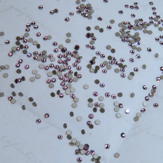 Cristales SWAROVSKI® 2058 redondos - Light Amethyst
