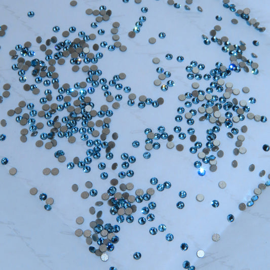 Gemas dentales SWAROVSKI® 2058 redondos - Aquamarine